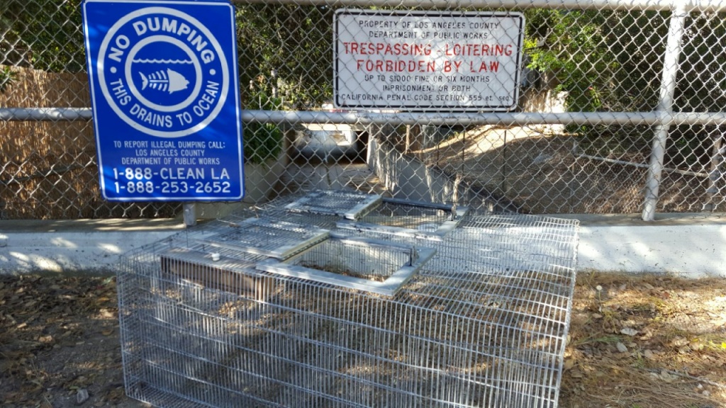 The open cage next to a storm wash in La Crescenta, where six chickens were abandoned and rescued by the Pasadena Humane Society on Friday, April 21, 2017.
The open cage next to a storm wash in La Crescenta, where six chickens were abandoned and rescued by the Pasadena Humane Society on Friday, April 21, 2017.