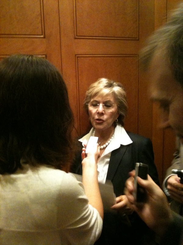 Barbara Boxer talking to reporters in elevator, August 5, 2010.