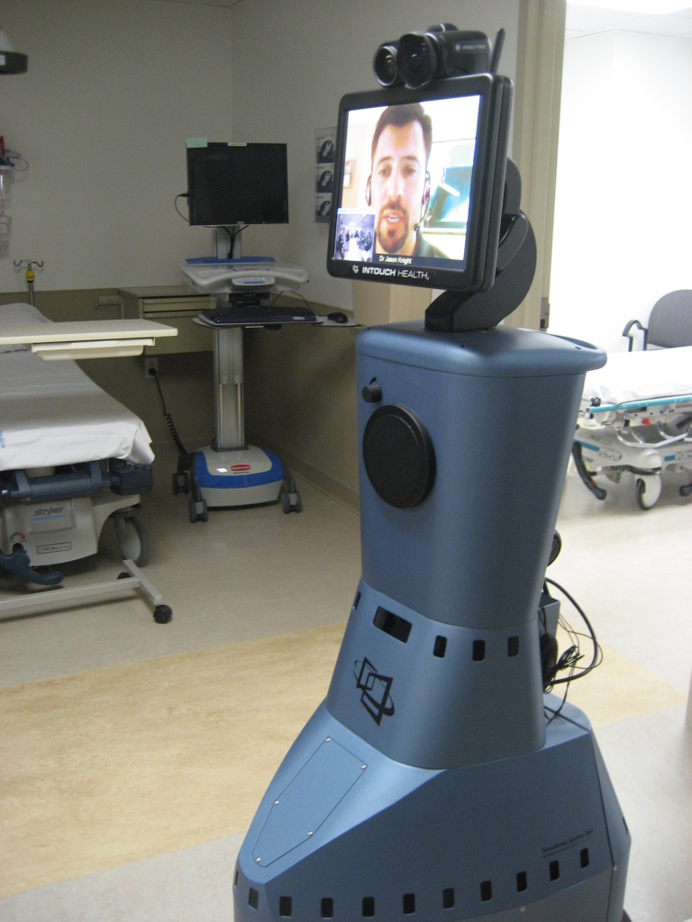 Dr. Jason Knight, a pediatric specialist at CHOC, remotely mans the robot named Sara at the new Hoag Hospital Irvine.