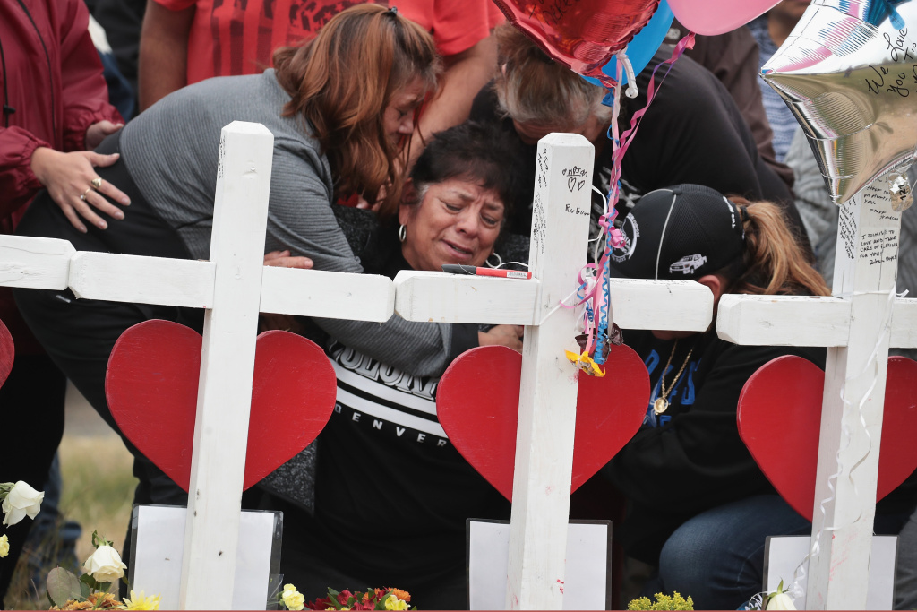 26 People Killed And 20 Injured After Mass Shooting At Texas Church Lilly Navejan is comforted after breaking down while visiting a memorial to honor the 26 people killed at the First Baptist Church of Sutherland Springs on November 5, 2017 in Sutherland Springs, Texas. Navejan lost her brother, Ricardo Rodriguez, and his wife, Therese, in the mass shooting.