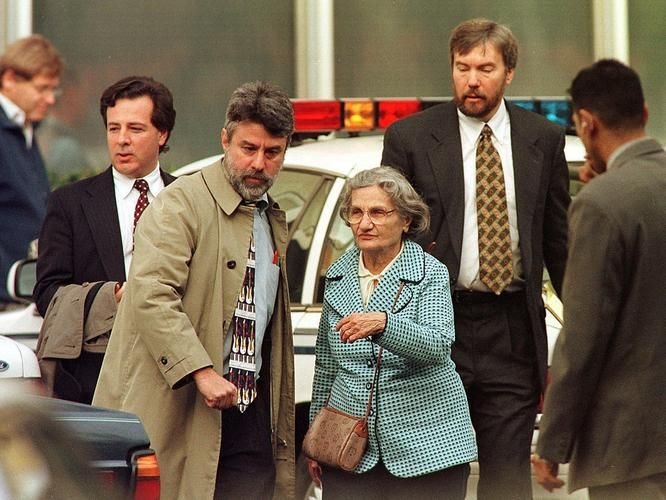 Wanda Kaczynski, center, and her son David Kaczynski, right background, are escorted to their car by defense lawyers after the suspected Unabomber Theodore Kaczynski pleaded guilty Jan. 22, 1998, in Sacramento, Calif.