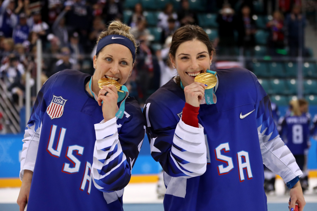 Ice Hockey - Winter Olympics Day 13 Gold medal winners Meghan Duggan #10 and Hilary Knight #21 of the United States celebrate after defeating Canada in a shootout in the Women's Gold Medal Game at the PyeongChang 2018 Winter Olympics on February 22, 2018.