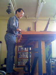 Mercer 8157 John Schneider, of Partch, playing the Bass Marimba.