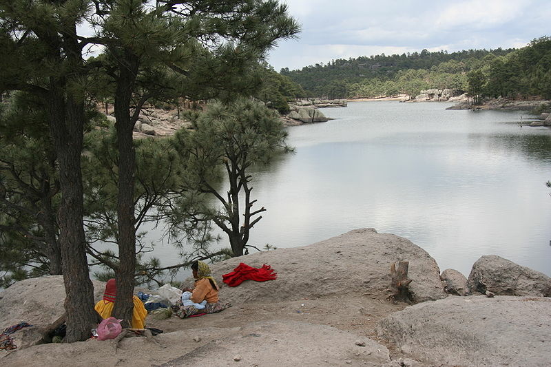 Tarahumara Two Tarahumara women (one with a baby nursing) at Arareco Lake near Creel, Chihuahua, Mexico. The Tarahumara are indigenous people of the Sierra Madre Occidental mountains in the state of Chihuahua in Mexico. The Tarahumara women wear the traditional brig