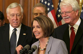 House Speaker Nancy Pelosi (D-CA) speaks at a news conference as House Majority Leader Steny Hoyer (D-MD) (L), and George Miller (D-CA) (R) listen in after the health care vote on Capitol Hill on March 22, 2010 in Washington, DC. The House passed the health care reform legislation that divided Congress with a vote of vote of 219 to 212.