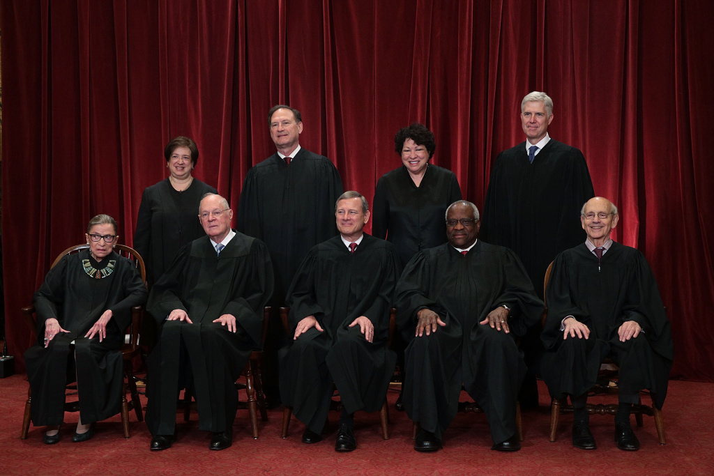 U.S. Supreme Court Justices Pose For Formal Portrait Front row from left, U.S. Supreme Court Associate Justice Ruth Bader Ginsburg, Associate Justice Anthony M. Kennedy, Chief Justice John G. Roberts, Associate Justice Clarence Thomas, and Associate Justice Stephen Breyer, back row from left, Associate Justice Elena Kagan, Associate Justice Samuel Alito Jr., Associate Justice Sonia Sotomayor, and Associate Justice Neil Gorsuch pose for a group portrait in the East Conference Room of the Supreme Court June 1, 2017 in Washington, DC.