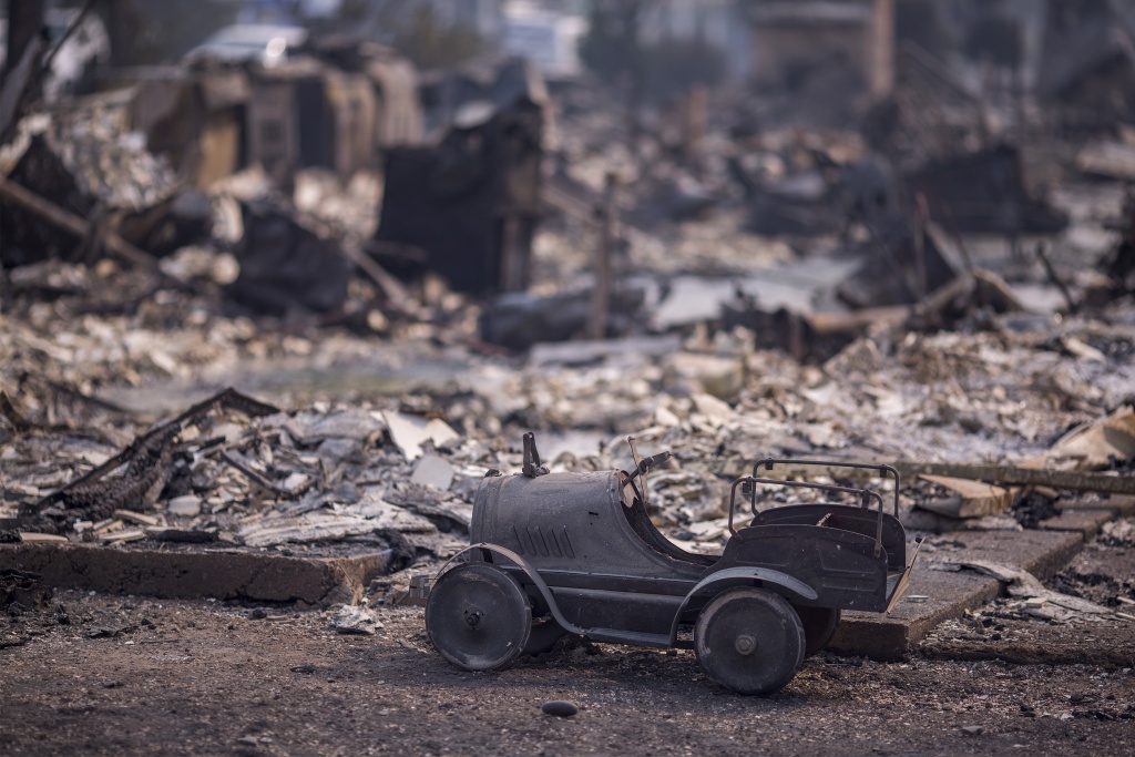 At Least 11 Dead As Multiple Wildfires Burn Through California Wine Country A toy car is left scorched in a neighborhood destroyed by fire near Cardinal Newman High School on October 10, 2017 in Santa Rosa, California.