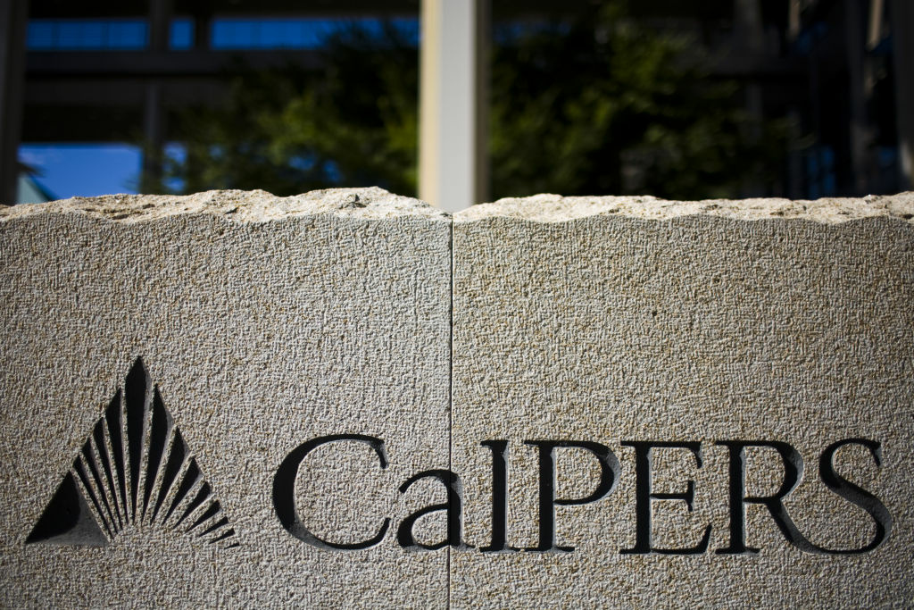 The nation's two largest public pension funds Monday reported double-digit annual returns from rising stock and real estate prices. The California Public Employees' Retirement System banked a 12.5 percent return and the California State Teachers' Retirement System earned 13.8 percent. (File photo: A sign stands in front of California Public Employees' Retirement System building in Sacramento, California).