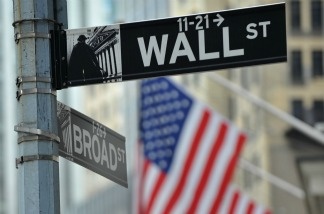 Mercer 20078 Street signs at the corner of Wall and Broad Streets at the New York Stock Exchange.