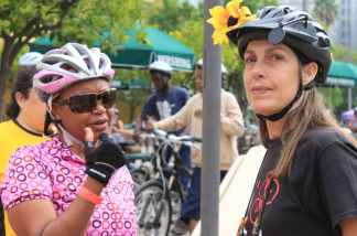 Vanessa Gray of Silver Lake (left) and her friend Alice Strong (right) of San Gabriel meet on Pershing Square just before their 18-mile bike tour through Los Angeles on June 27, 2010.