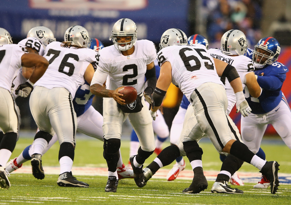 Oakland Raiders v New York Giants Terrelle Pryor #2 of the Oakland Raiders in action against the New York Giants during their game at MetLife Stadium on November 10, 2013 in East Rutherford, New Jersey.