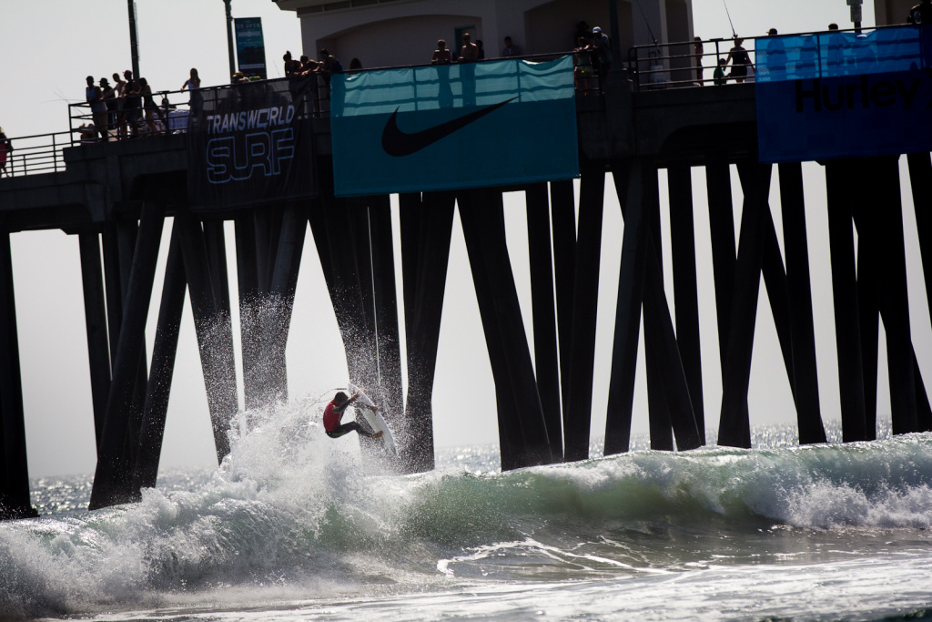 U.S. Open of Surfing A surfer catches air near the Huntington Beach pier during the U.S. Open of Surfing competition on Friday, August 3, 2012.