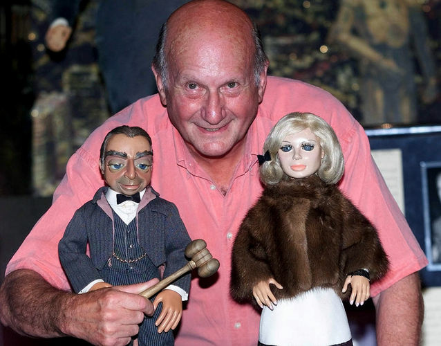 Thunderbirds creator Gerry Anderson has died at age 83. Here, he poses with puppets Parker and Lady Penelope from the series, shortly before a 2001 auction in London.