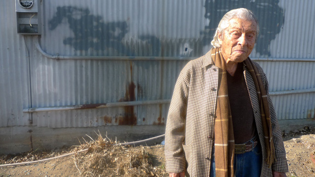 people of the Delta series Nicholas Cotano walks through a former agricultural labor camp on Twitchell Island.