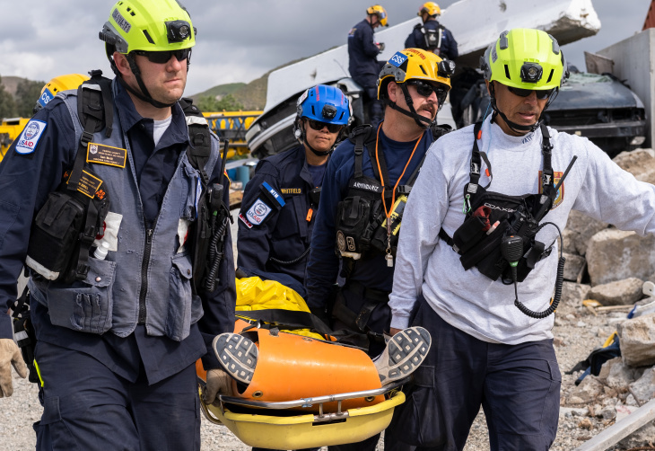 search and rescue Urban Search and Rescue workers carry a victim away from a simulated earthquake near Castaic, California, in an April 3, 2019 training exercise.