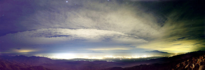 light pollution and milky way Light pollution over Joshua Tree National Park in Southern California.